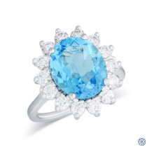 14kt White Gold Blue Topaz And Maple Leaf Diamond Ring