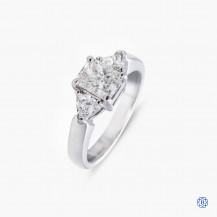 Platinum three stone diamond engagement ring